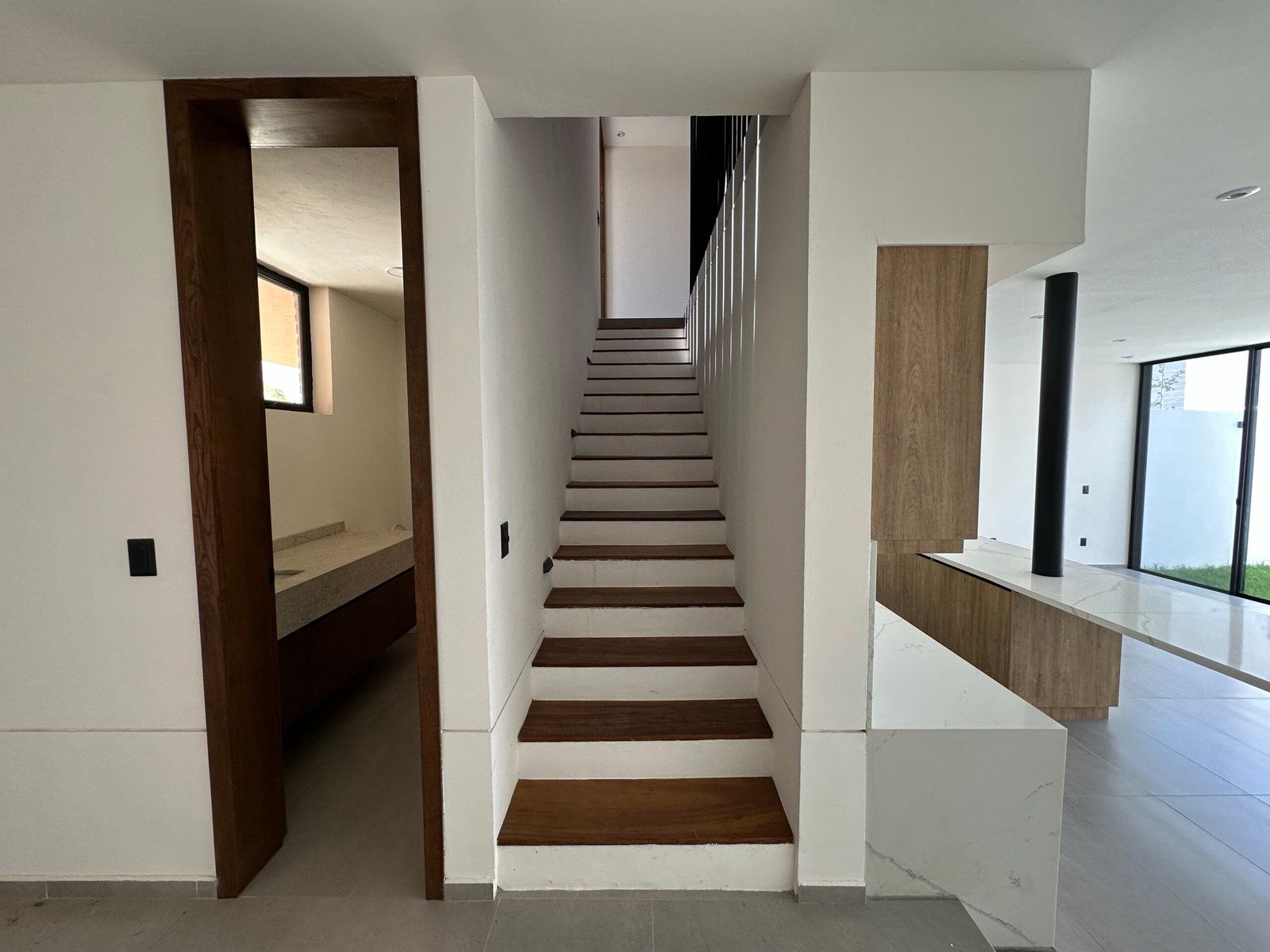 Escalera y conexión interior de Casa 19
